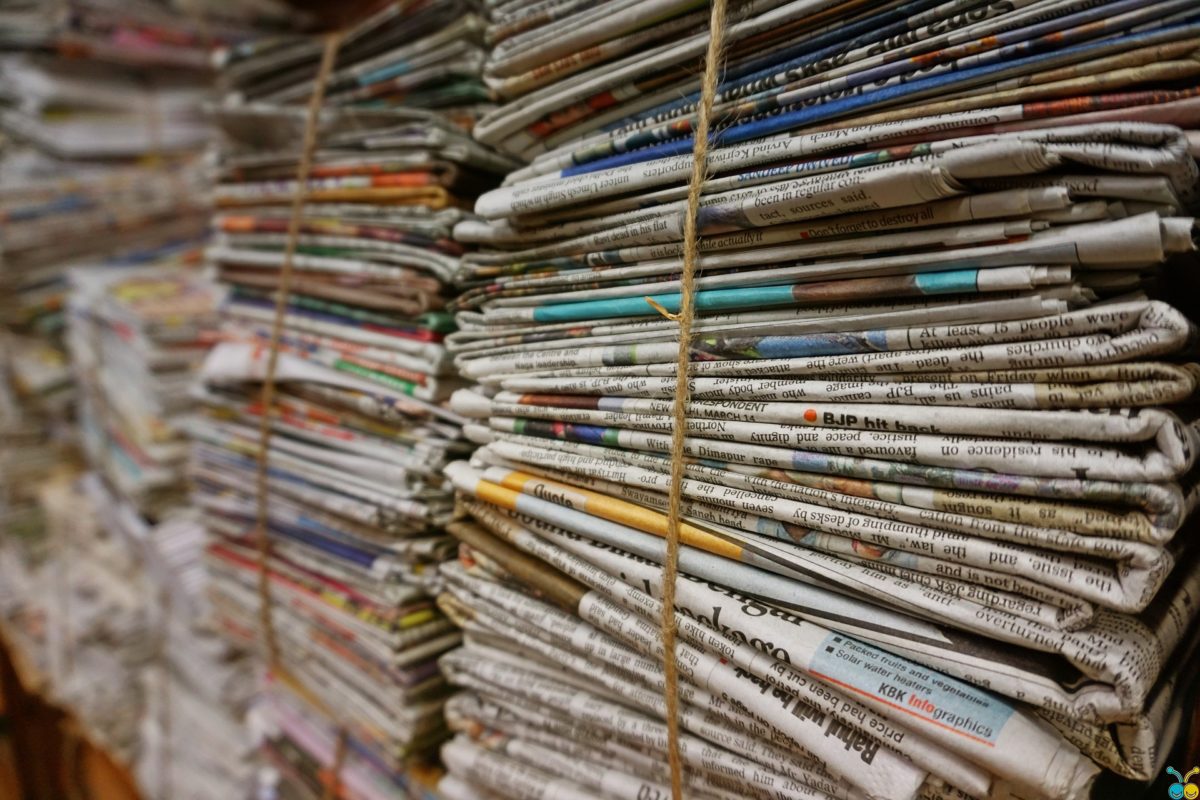 Bundles of old newspapers stacked up