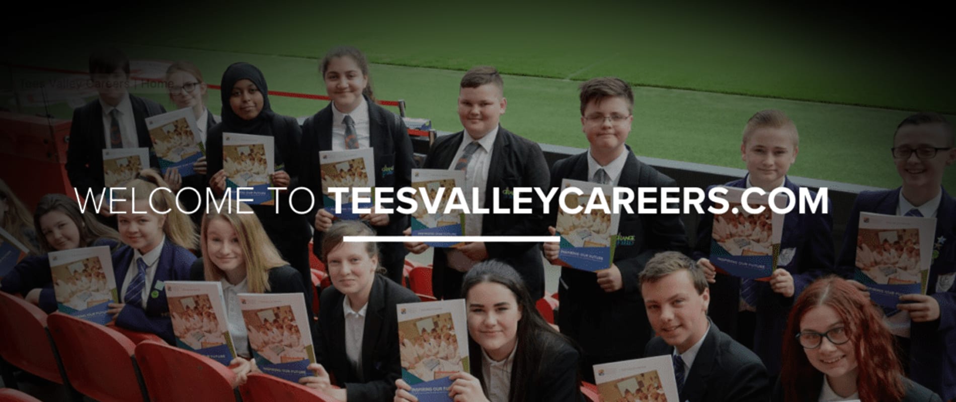 School students holding Tees Valley Careers brochures