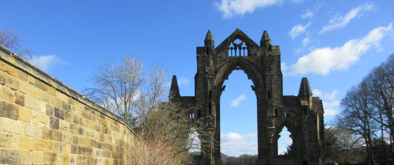 Photo of Gisborough Priory against blue summer sky