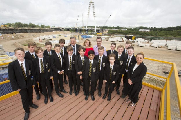 Photograph of group of school children overlooking bridge construction