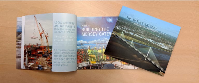 Photo of cover and inner spread of Mersey Gateway commemorative book